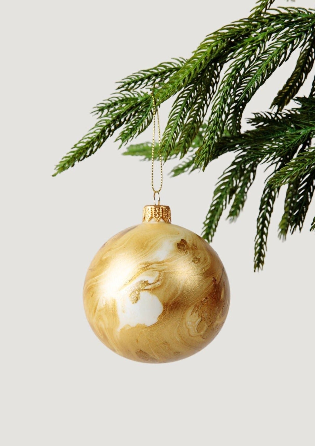 Round Glass Bulb Christmas Ornament in Gold Marble - 3"